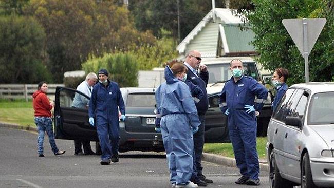 Police investigate the scene of the double stabbing in Casterton, Western Victoria, in 20