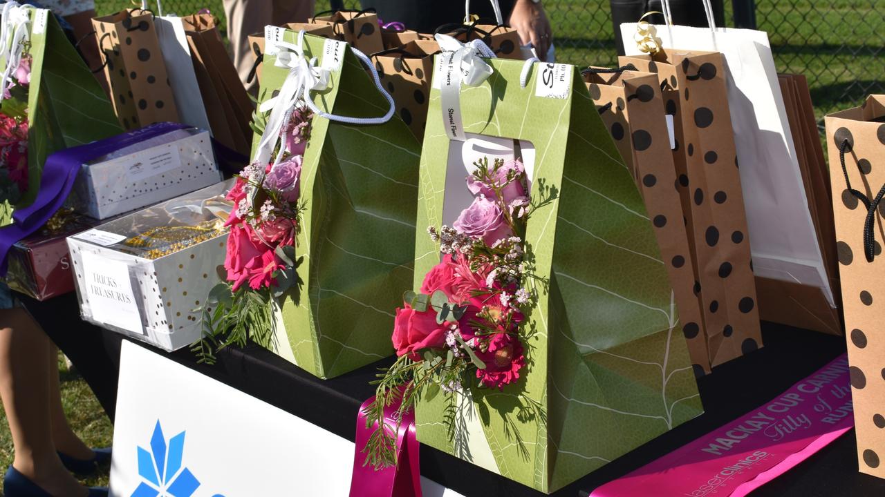 Table full of prizes for the winners and runners up in the Mackay Cup 2021 Fashions on the Field