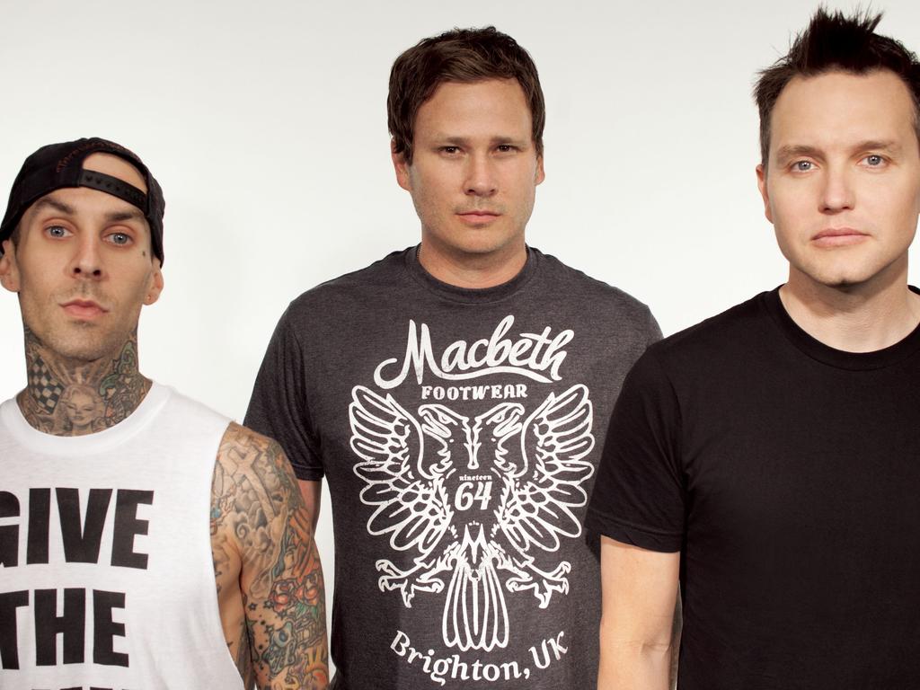 DeLonge (centre) with former Blink-182 bandmates Travis Barjker (left) and Mark Hoppus. Picture: Supplied