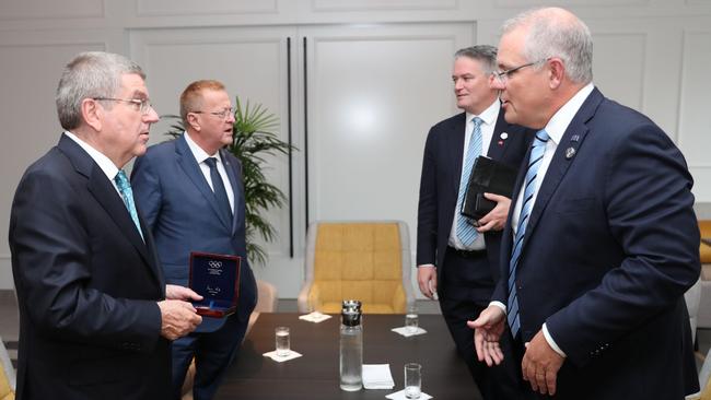 Olympics chiefs Thomas Bach and John Coates with Prime Minister Scott Morrison and Finance Minister Mathias Cormann at the G20 Summit earlier this month.