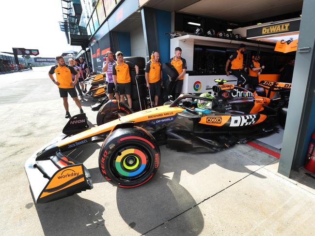 McLaren driver Lando Norris leaves the pit garage during P2. Picture: David Caird