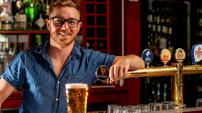 Pubs are looking forward to getting rid of the time limits and being able to serve a beer without also having to serve food. Tom Sheridan from the Deck Bar serves up a coldie in preparation. Picture: Che Chorley