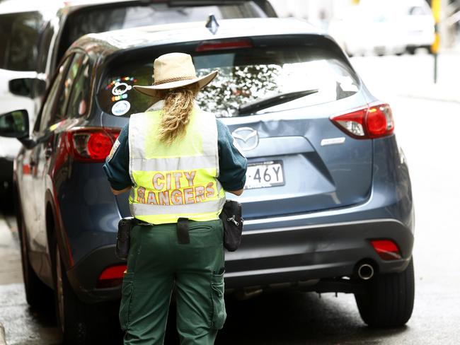 Councils could be forced to leave a sticker or change every parking sign in their LGA. Picture: John Appleyard