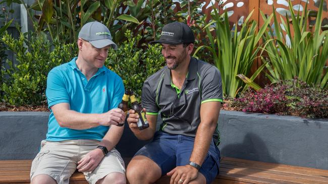 Anthony Clouting and Malcolm Van de Graaff toast the new garden. Photo: Dominika Lis