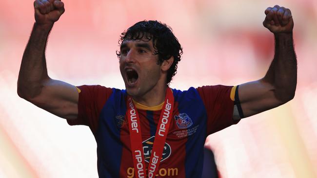 Mile Jedinak of Crystal Palace celebrates victory in the Championship Play-off Final.