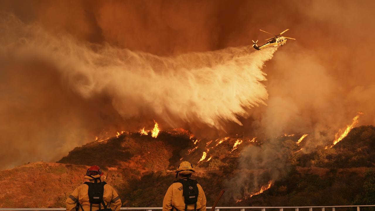 LA’s largest fire targets new areas despite ‘relentless’ air attack