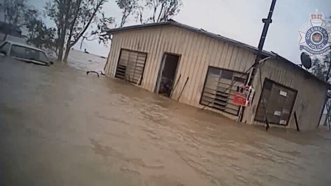 The man’s home was inundated by rising flood waters when police got to the property.