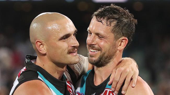 New Port Adelaide leader Sam Powell-Pepper (left). Picture: Sarah Reed/AFL Photos via Getty Images