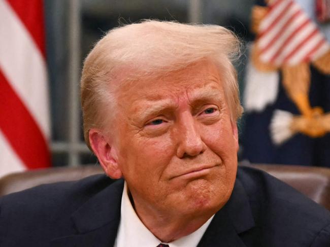 US President Donald Trump signs executive orders in the Oval Office of the White House in Washington, DC, on January 20, 2025. Picture: NewsWire / Jim WATSON / POOL / AFP