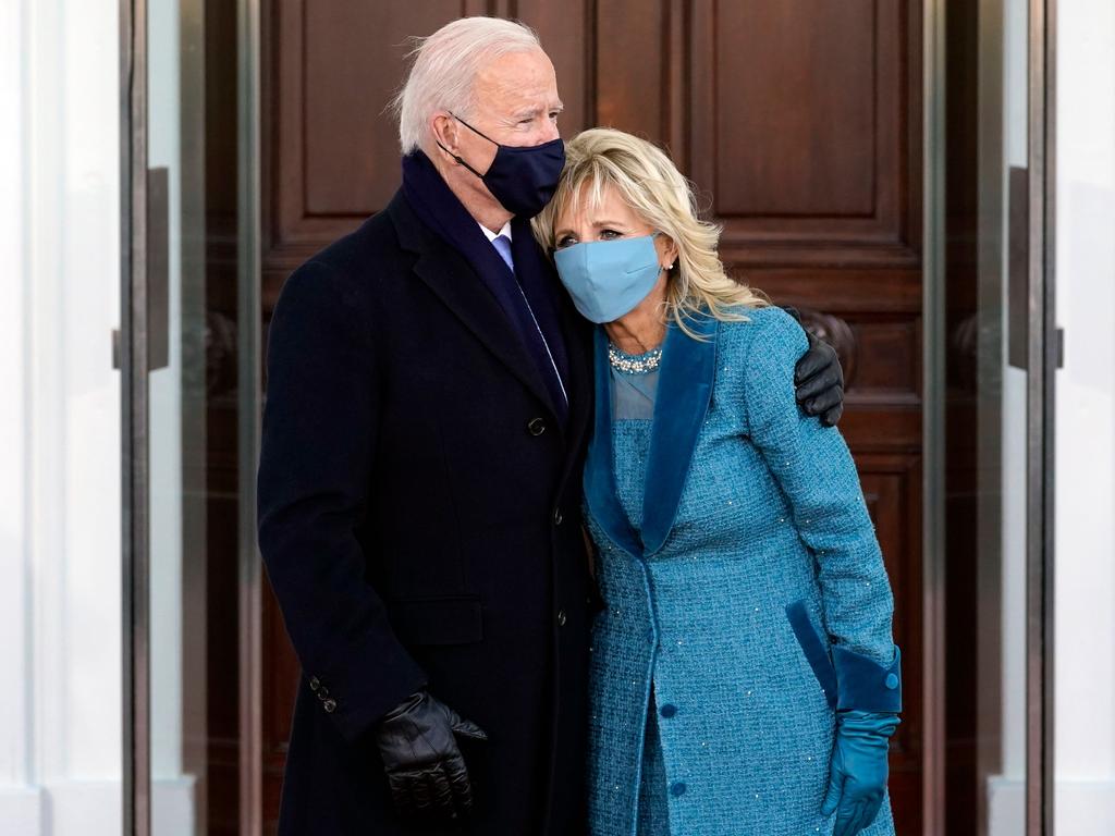 Mr Biden and wife Jill at the White House, looking far more affectionate than Donald and Melania Trump usually did. (Photo by Alex Brandon / POOL / AFP)
