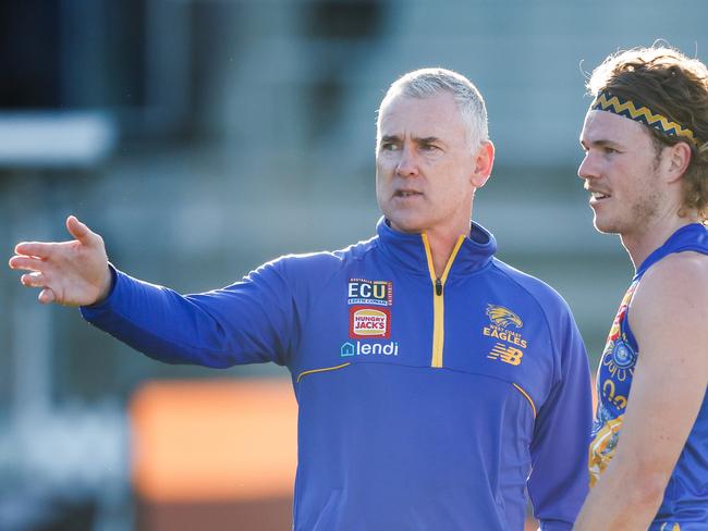 LAUNCESTON, AUSTRALIA - MAY 21: Adam Simpson, Senior Coach of the Eagles chats with Jayden Hunt of the Eagles during the 2023 AFL Round 10 match between the Hawthorn Hawks and the West Coast Eagles at UTAS Stadium on May 21, 2023 in Launceston, Australia. (Photo by Dylan Burns/AFL Photos via Getty Images)