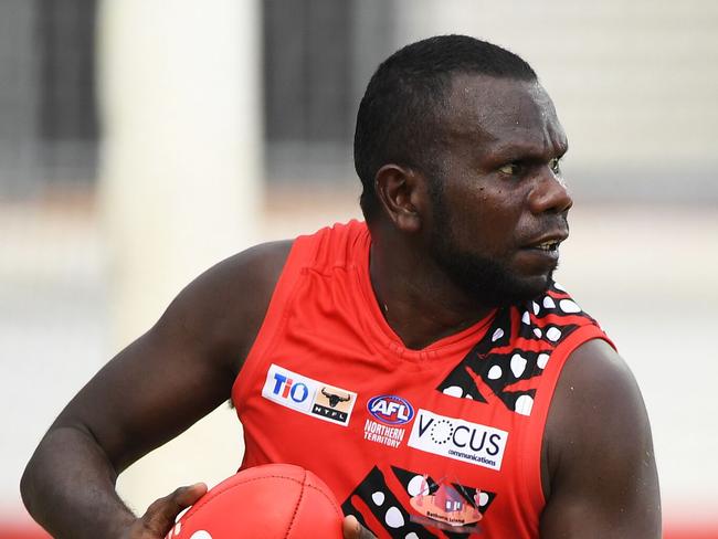 Simon Munkara spins towards goal in a pose that has transpired through several seasons as an original Tiwi Bomber. Picture: AFLNT/Media