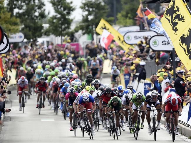 The pack sprints ahead of the finish line at the end of the 163.5km fourth stage.