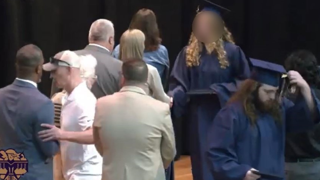 He quickly made his way to Superintendent Rainey Briggs and pushed him aside. Picture: YouTube@MAXTVBARABOO