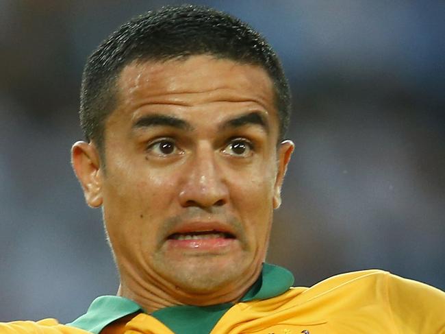 SYDNEY, AUSTRALIA - JANUARY 13: Tim Cahill of Australia jumps to head the ball during the 2015 Asian Cup match between Oman and Australia at ANZ Stadium on January 13, 2015 in Sydney, Australia. (Photo by Mark Kolbe/Getty Images)