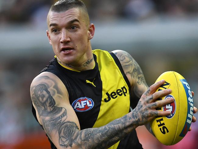 Dustin Martin of the Tigers is seen in action during the Round 23 AFL match between the Richmond Tigers and the St Kilda Saints at the MCG in Melbourne, Sunday, August 27, 2017. (AAP Image/Julian Smith) NO ARCHIVING, EDITORIAL USE ONLY