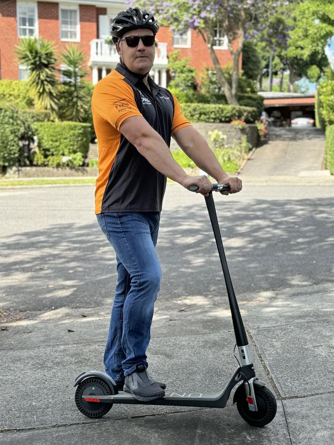 Brad Beard, former owner of a Ford Falcon FPV GT, now rides an electric scooter. Picture: Supplied.