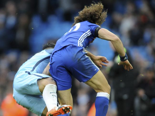 Manchester City's Sergio Aguero, left, is red carded for this tackle on Chelsea's David Luiz