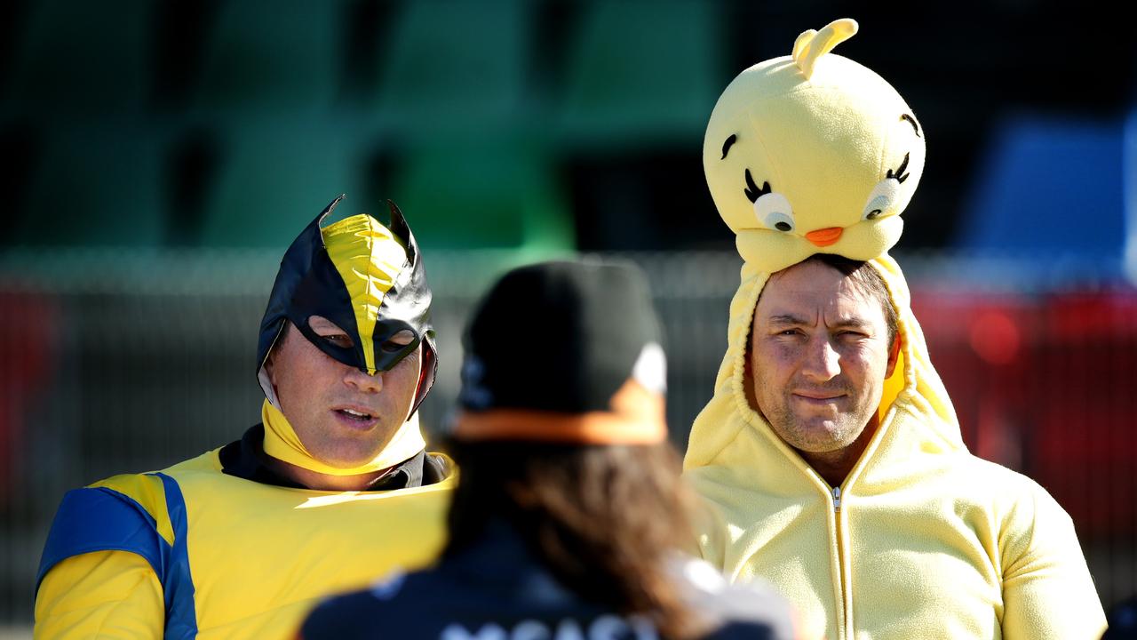 Fletch and Hindy film a segment with Aaron Woods during Wests Tigers media session at Concord Oval.