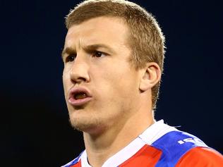 CANBERRA, AUSTRALIA - AUGUST 25:  Trent Hodkinson of the Knights is pictured with 'Hannah' on his forearm taping out of respect for the passing of Hannah Rye during the round 25 NRL match between the Canberra Raiders and the Newcastle Knights at GIO Stadium on August 25, 2017 in Canberra, Australia.  (Photo by Mark Nolan/Getty Images)