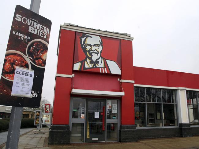A closed sign is seen outside a KFC restaurant near Ashford, England. Picture: Gareth Fuller/PA via AP