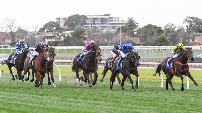 It’sourtime (navy blue and white checks) found the line intently in the Group 3 Bletchingly Stakes. Picture: Brett Holburt–Racing Photos via Getty Images