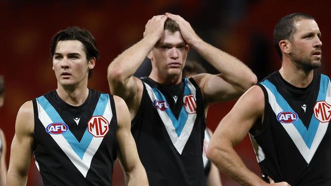 Port Adelaide's Connor Roze and Mitch Georgiades leave the field during the AFL Round 14 AFL match between the GWS Giants and Port Adelaide Power at Engie Stadium, Sydney on June 16, 2024.. Photo by Phil Hillyard(Image Supplied for Editorial Use only - **NO ON SALES** - Â©Phil Hillyard )