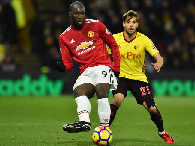 Romelu Lukaku (L). / AFP PHOTO / Glyn KIRK