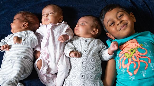 Ram, Meera, and Aadhi with their big brother, Vyaas.