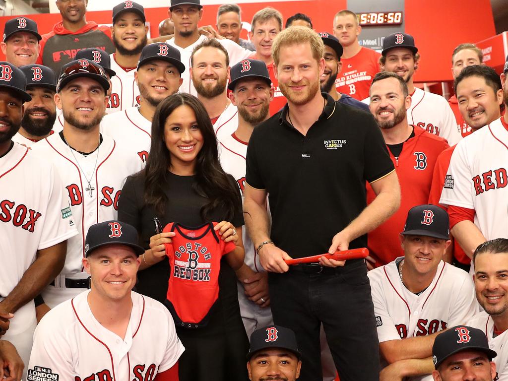 Prince Harry, Duke of Sussex and Meghan, Duchess of Sussex join the Boston Red Sox in their Clubhouse and receive gifts for Archie. Picture: Chris Jackson/Invictus Games Foundation via Getty Images.