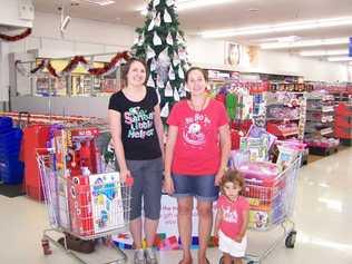 Erin McGovern and Amy Williamson show off the haul donated to the wishing tree. Photo: Contributed . Picture: contributed