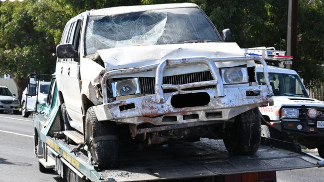 The damaged Holden is towed away from the scene. Picture: ABC / Caroline Horn