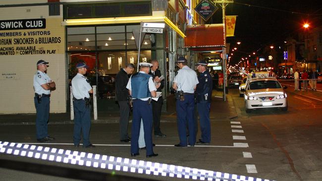 Police at the Brunswick Club where Lewis Moran was shot and murdered in 2004. Picture: Craig Borrow