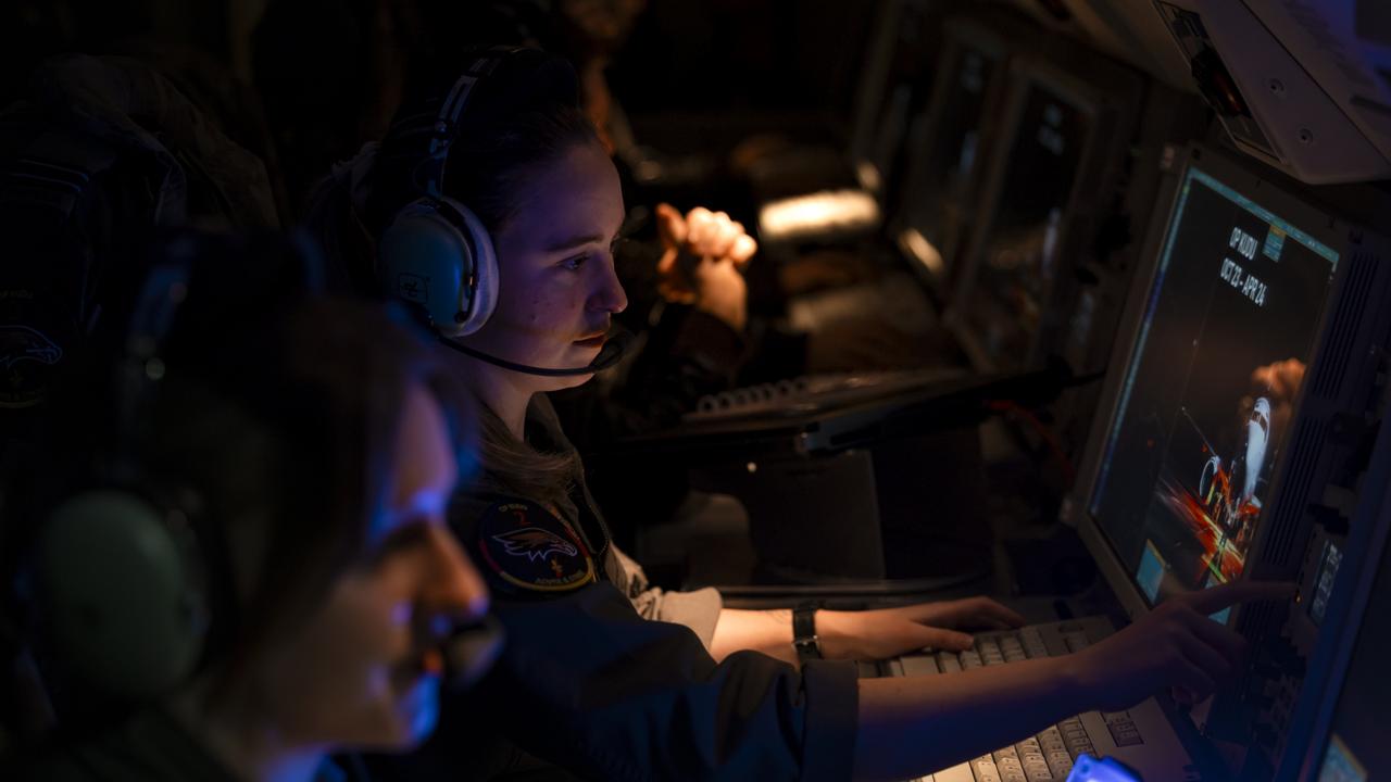 Surveillance and control officers at their terminals on a Royal Australian Air Force E-7A Wedgetail aircraft deployed on Operation Kudu in Germany. Image has been digitally altered for security purposes. Picture: Cpl Nicole Dorrett