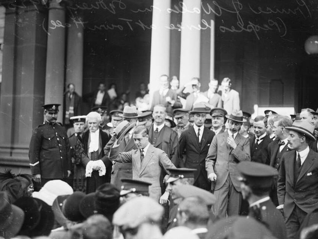 Edward VIII Prince of Wales surrounded by a group outside the Sydney Town Hall. Picture: National Library of Australia