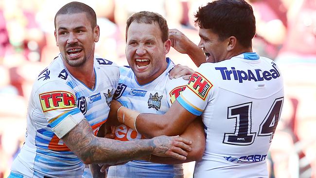 Tyrone Roberts (middle) celebrates a try. Picture: Getty Images