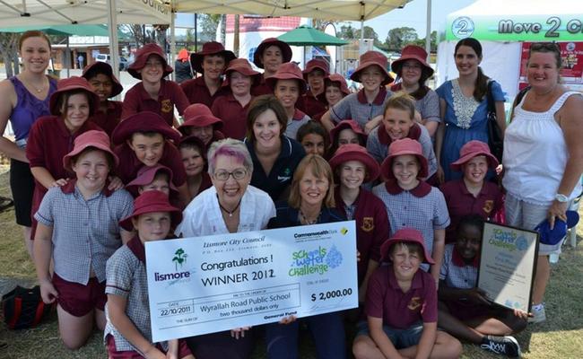 Lismore mayor Jenny Dowell, Council's Water Education Officer Danielle McAtee and Rous Water's Barbara Jensen with Wyrallah Road Public School students and staff after they were announced the Schools Water Challenge winner for 2012 at the Lismore Show on Friday.