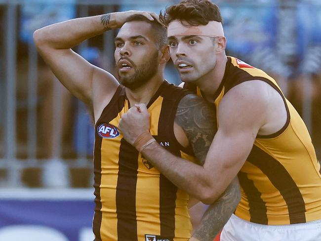 ADELAIDE, AUSTRALIA - APRIL 16: Jarman Impey (left) and Conor Nash of the Hawks look on during the 2023 AFL Round 05 match between the GWS Giants and the Hawthorn Hawks at Norwood Oval on April 16, 2023 in Adelaide, Australia. (Photo by Michael Willson/AFL Photos via Getty Images)