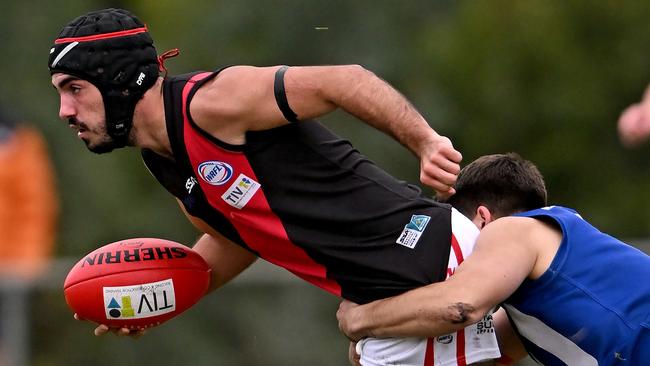 BraybrookÃs Nicholas Papakalodoukas and AlbanvaleÃs Bobby Saric during the WRFL Albanvale v Braybrook football match in Deer Park, Saturday, April 30, 2022. Picture: Andy Brownbill