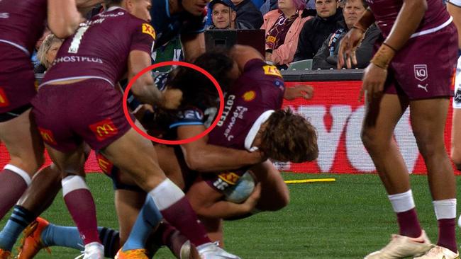 Reece Walsh grabs hold of Jarome Luai’s hair.