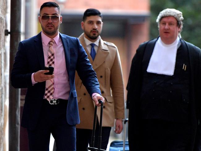 Salim Mehajer (left) with his legal team including Mahmoud Abbas (centre) and Barrister Marcus Young outside court in 2017. Picture: AAP