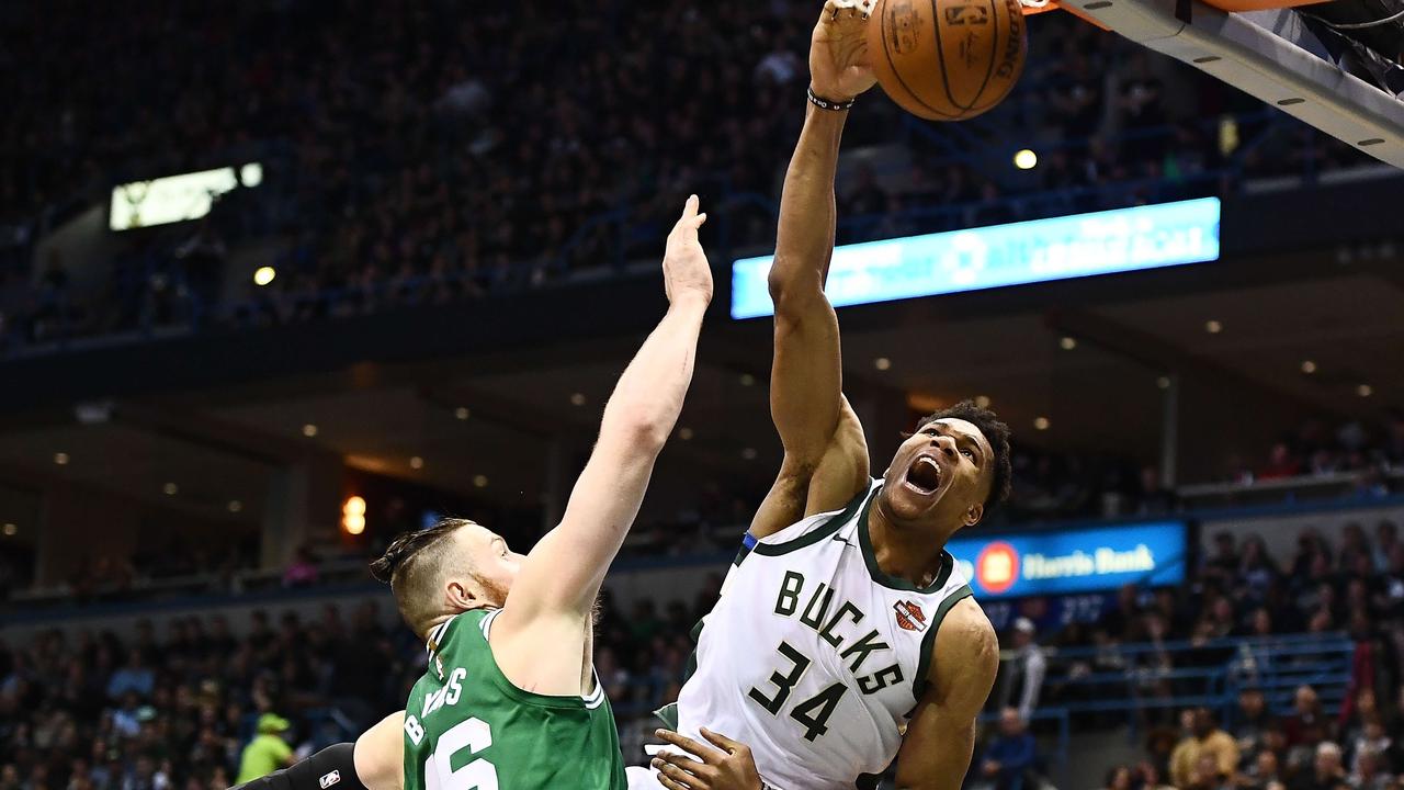 giannis antetokounmpo dunks from outside the three point line