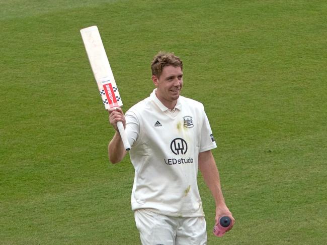 Cameron Green scoring a century for Gloucestershite