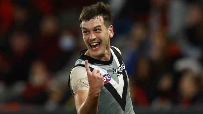 Zak Butters of the Power celebrates kicking a goal against Essendon earlier this year. Picture: Daniel Pockett/Getty Images