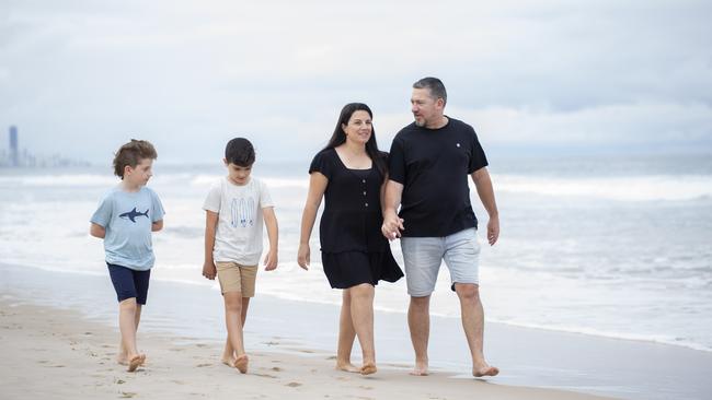 Even a cloudy Gold Coast day is better than the bitter cold of Melbourne for the Taylors. Picture: Russell Shakespeare