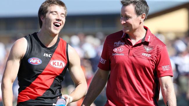 Essendon coach John Worsfold has laugh with Zach Merrett after the match. Picture: Michael Klein