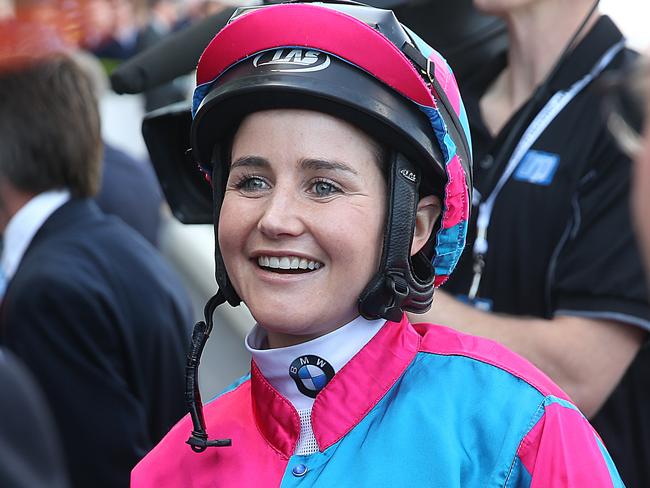 Caulfield Races.Caulfield Guineas Day. Race 2 Ladbrokes Stakes. Jockey Michelle Payne talks with connections before her ride on Dandy Gent. Picture : Ian Currie