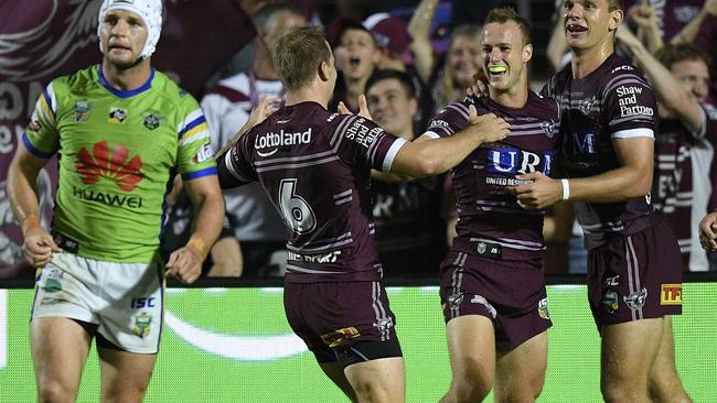 Jarrod Croker watches on after another Manly try.