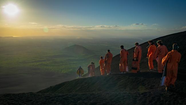 Hikers prepare to board down Nicaragua's Cerro Negro volcano. Picture: Ben Turnbull/Unsplash