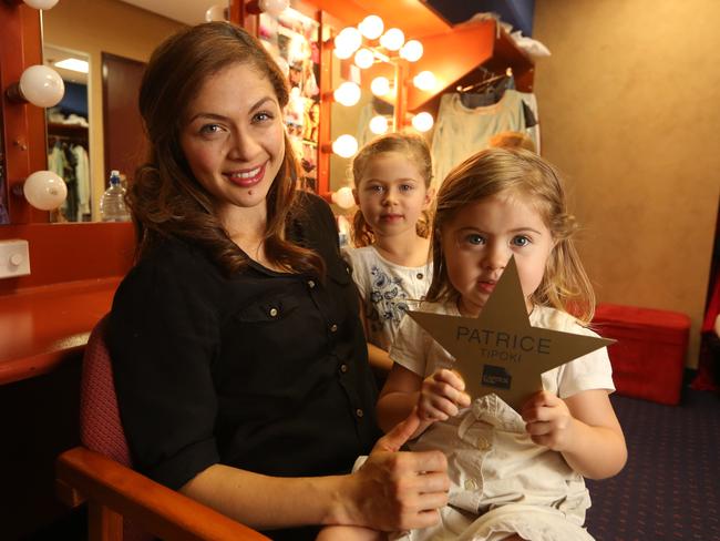 Patrice Tipoki, who stars as Fantine, in her dressing room with daughters Libby, 5, and Addy, 2.